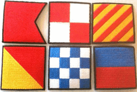 a photo of six square nautical signal flag patches